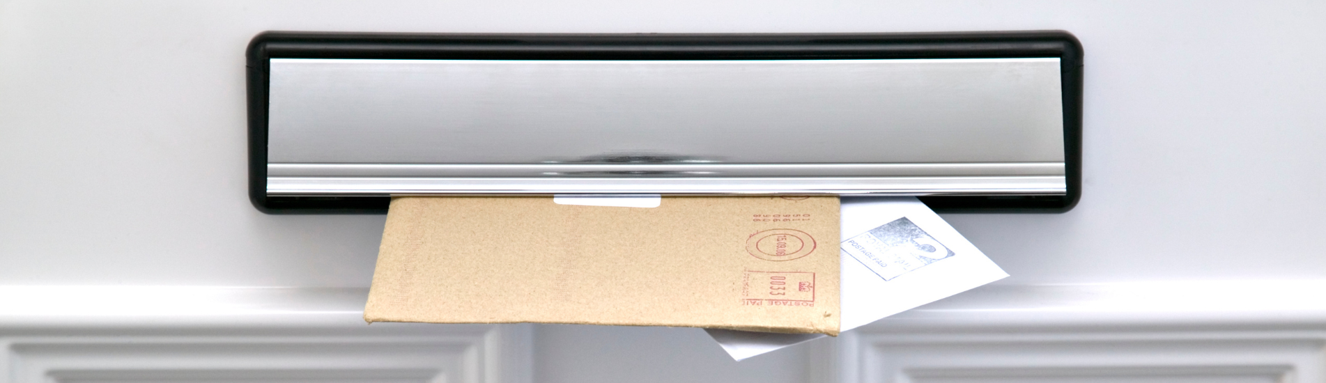 what-is-an-intumescent-letterbox-hero mail through a letterbox