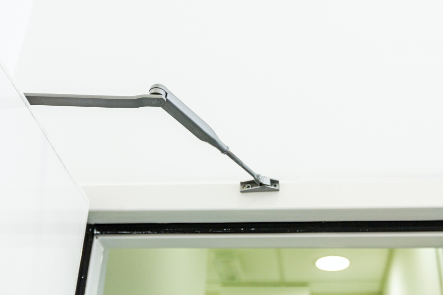 adjusting a fire door closer